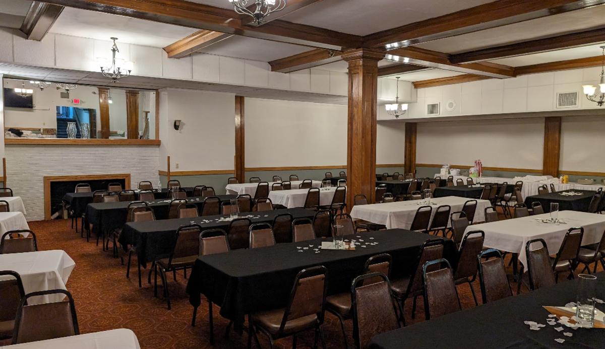 A decorative background image featuring the Harbor Room rental space in the Elks Lodge in Superior, WI