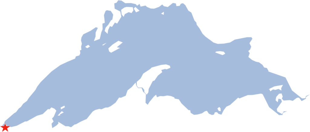 An illustrated picture of Lake Superior in blue on a white background with a red star over the location of Superior, WI.